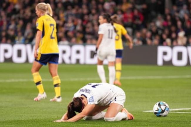Alex Morgan reacts after a missed shot at goal