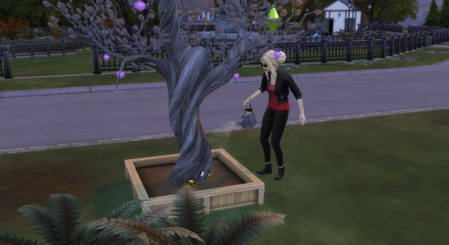 A vampire Sim watering a plasma tree