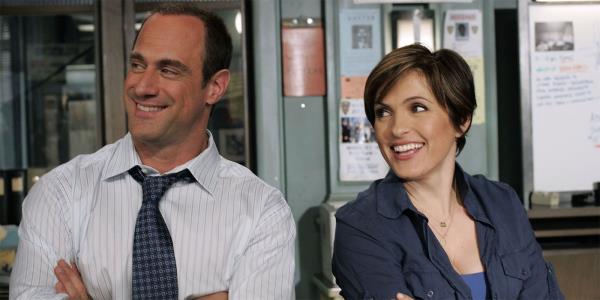 Elliot Stabler and Olivia Benson smiling in Law and Order SVU