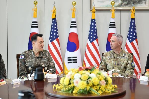 Joint Chiefs of Staff (JCS) Chairman Adm. Kim Myung-soo (L) meets Gen. Stephen Whiting, head of the U.S. Space Command, at his office in Seoul on April 22, 2024, in this photo provided by the JCS. (PHOTO NOT FOR SALE) (Yonhap)