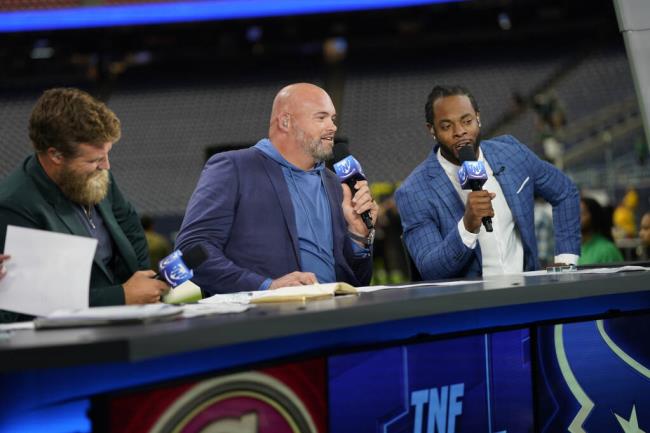 NFL Thursday Night Football crew members Ryan Fitzpatrick, left, Andrew Whitworth, center, and Richard Sherman talk before a game between the Houston Texans and the San Francisco 49ers, Aug. 25, 2022, in Houston. (David J. Phillip / ASSOCIATED PRESS)