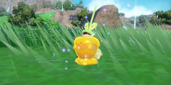 A shiny Dipplin with glittering stars around in Pokemon Scarlet & Violet:The Teal Mask.